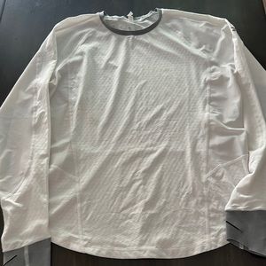 Under Armor ladies XL long sleeve white workout top.